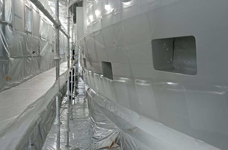 a painted ship in the garage