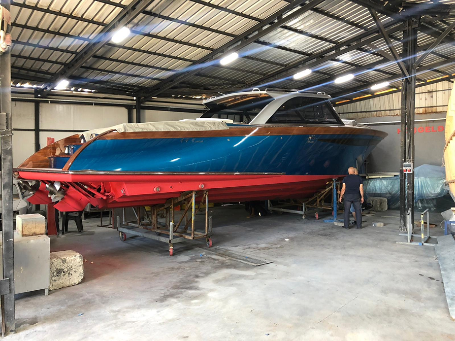a painted boated in the garage